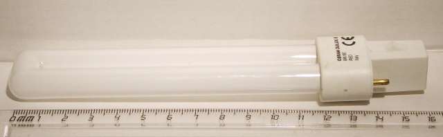 Osram Dulux S G23 9W/60 Red Compact Fluorescent Lamp - Shown adjacent to a ruler to show size