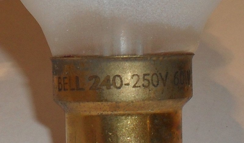 BELL 60W Twisted Candle Lamp with Amber Tip - Detail of text printed on lamp base