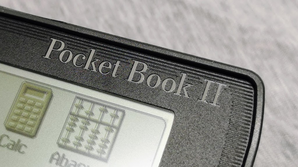 Acorn Pocket Book II branding shown above the display