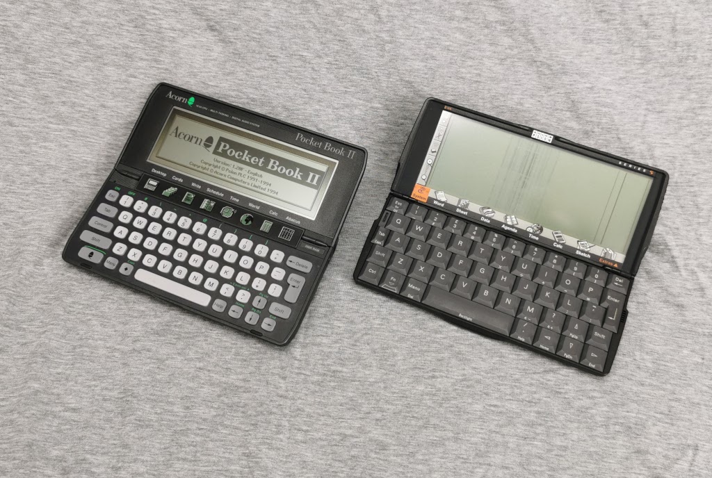 Acorn Pocket Book II (left) shown next to a Psion Series 5 (right).