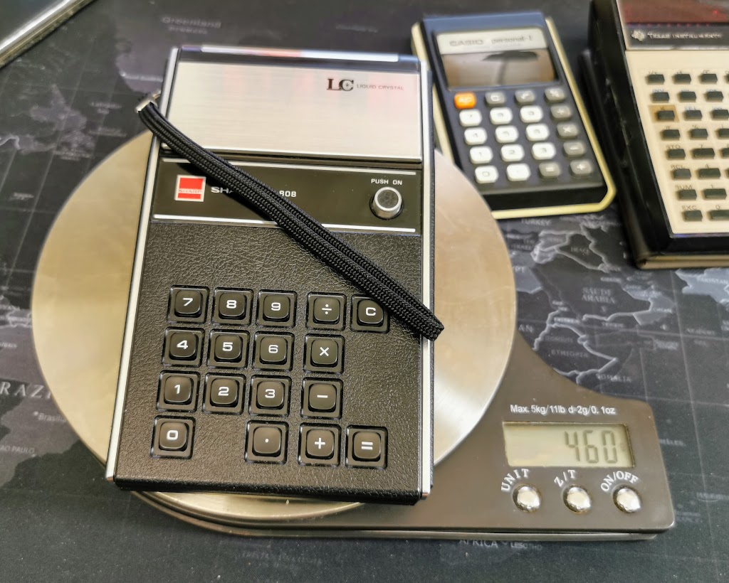 Weight of Sharp EL-808 Calculator when fitted with alkaline batteries, 460g or 1.01lb.