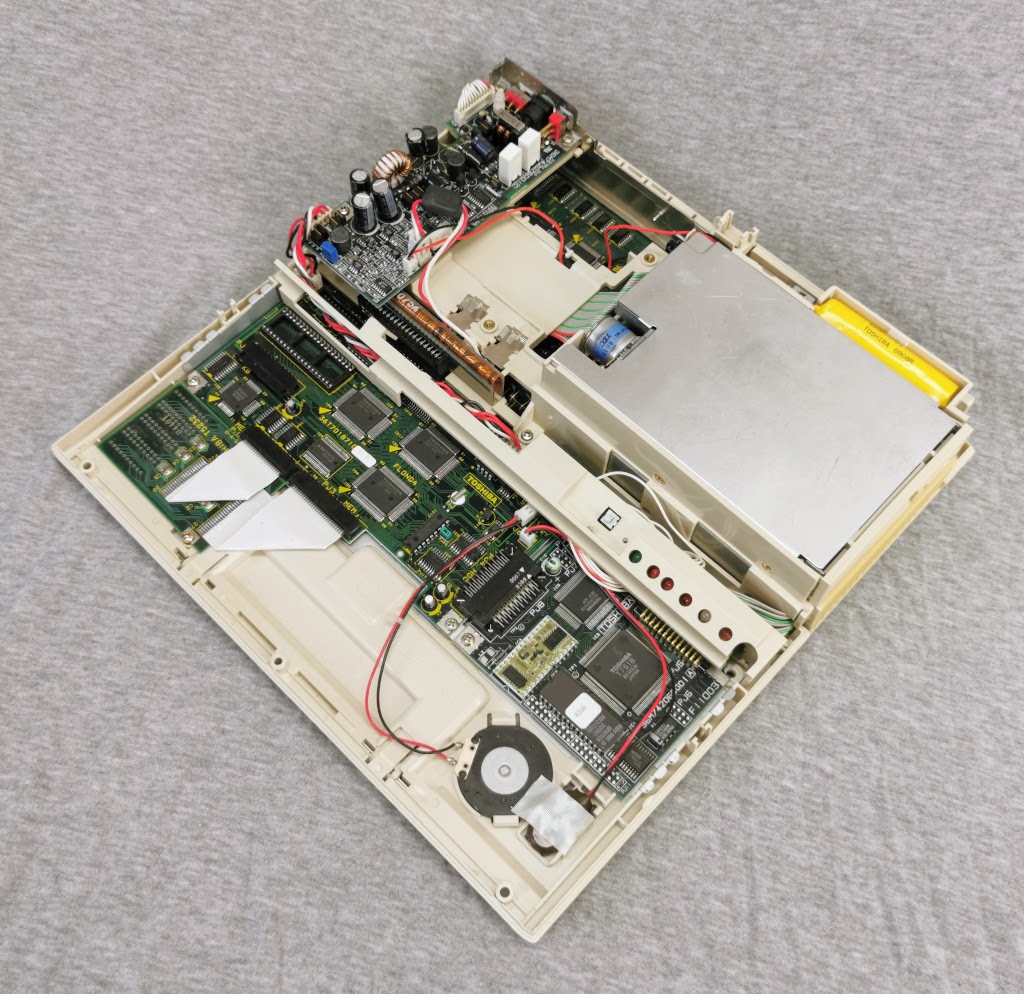 Toshiba T1200 with top cover removed viewed from system right
