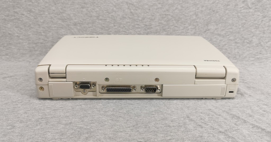 Rear of a Toshiba T1950CT showing port covers open